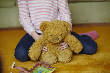 Child with teddy