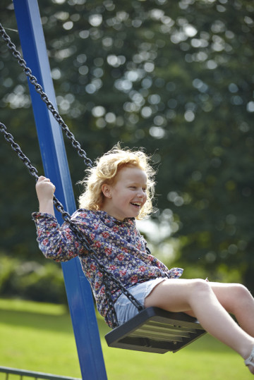 Girl on swings