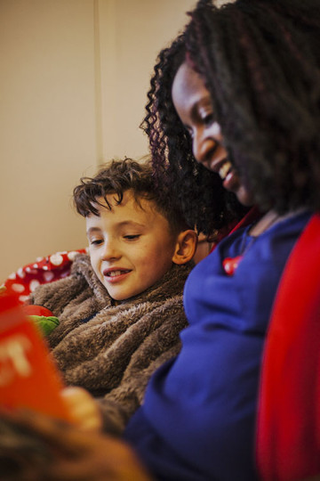 Mother with son reading