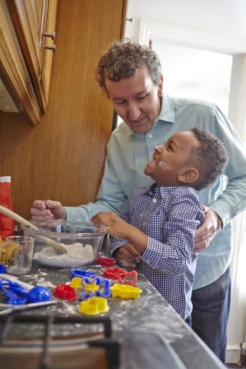 Dad with son baking