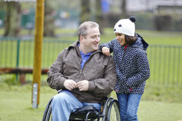 Dad with daughter in park