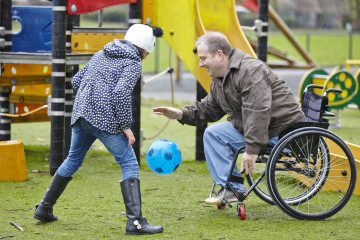 Dad with daughter in park