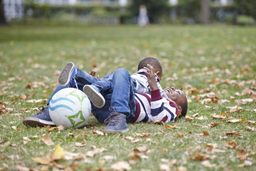 Playful wrestling in park