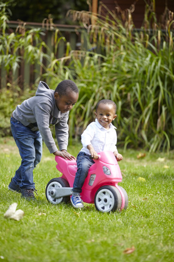 Siblings on bike