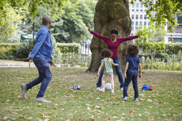 Family playing football