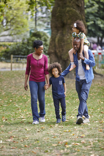 Family stroll in park