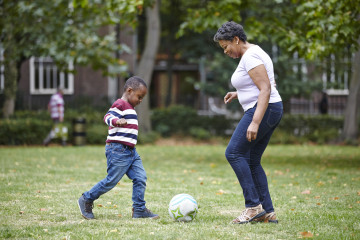 Having a kick around with mum