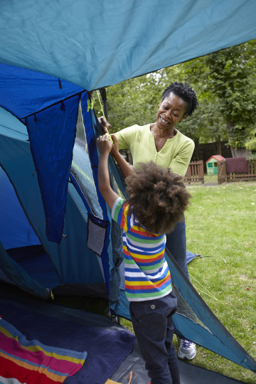 Helping mum erect the tent