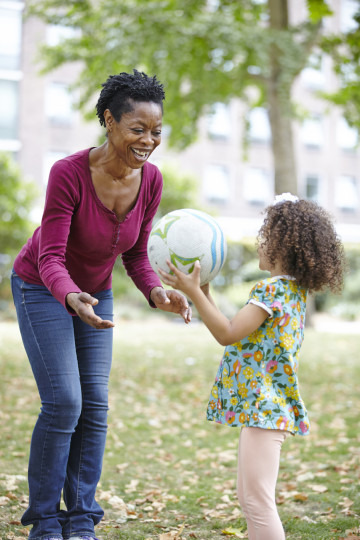 Mum and daughter play ball