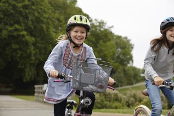 Girls cycling in the park