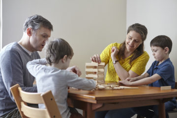 Family playing Jenga