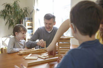 Family playing at table