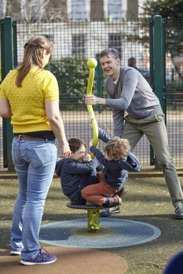 Family plays in parks