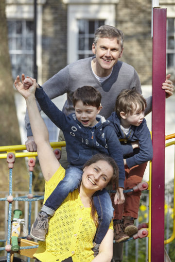 Parents playing with children