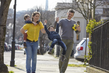 Parents playing with sons