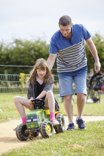 Girl on tractor