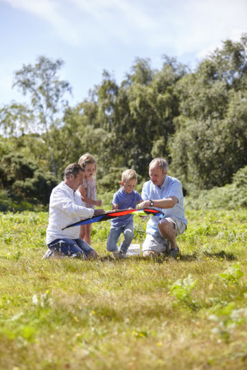 Family using kite together