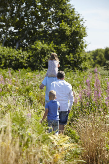 Family walking away from camera