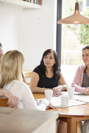 Social worker at table