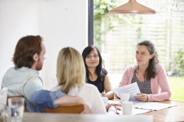 Social Worker at table