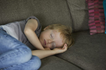 Sleeping boy on the couch