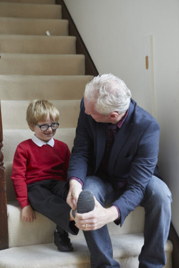 Putting on shoes before school