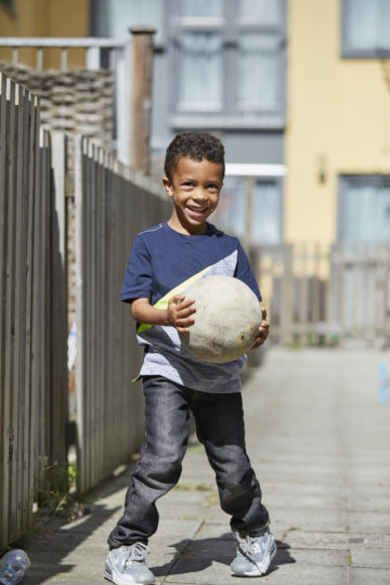 Smiling with the football