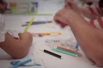 Children colouring in at Adoption Activity Day